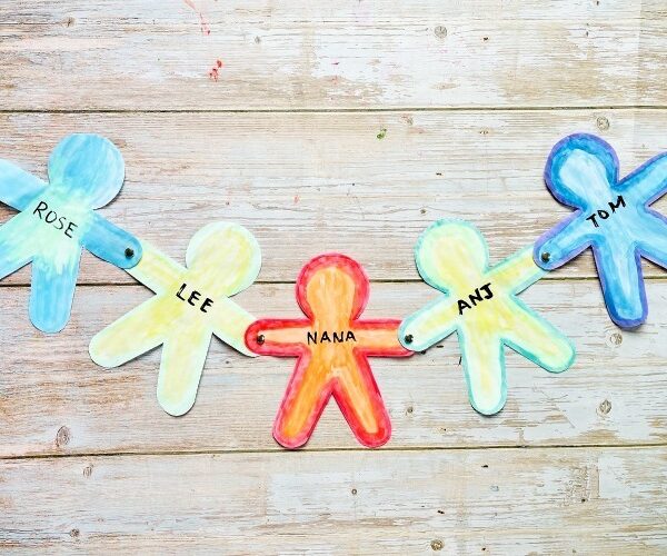 Paper Friends Holding Hands